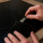 Réparer une plaque induction fissurée : est-ce possible, comment faire et à quel prix ?