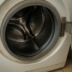 Tambour lave-linge désaxé : causes, symptômes et solutions pour le réparer